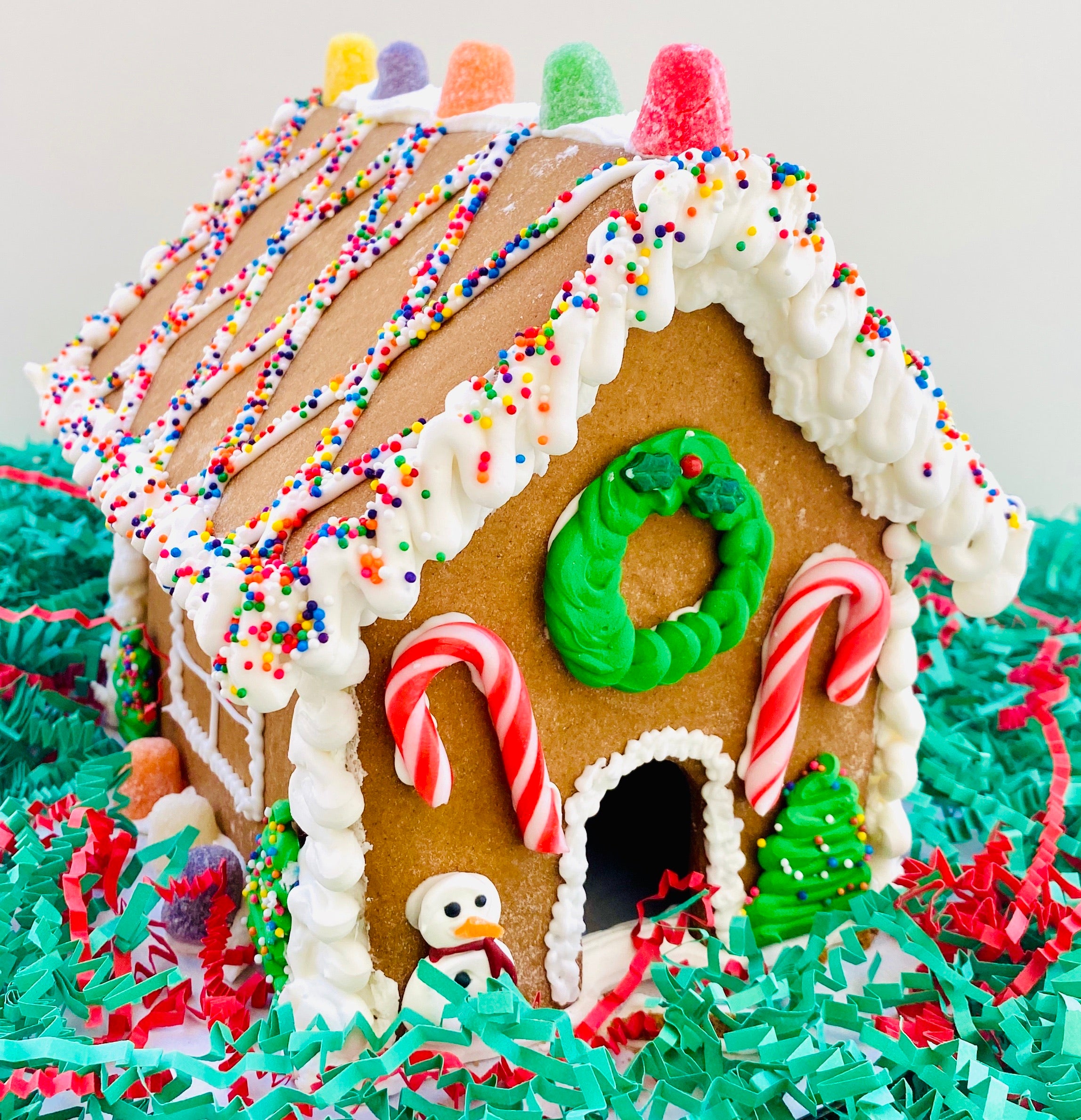 OUR SIGNATURE GINGERBREAD HOUSE